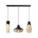 Modern industrial kitchen lamp featuring a square disc with three ribbed glass pendant lights, combining wood and metal elements, suspended from the ceiling.