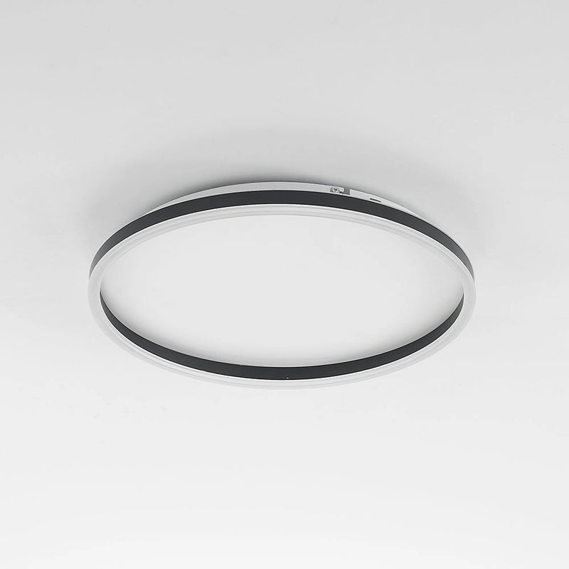 Minimalist black and white thin bangle bracelet with an elegant unisex design, showcasing a sleek and modern aesthetic.