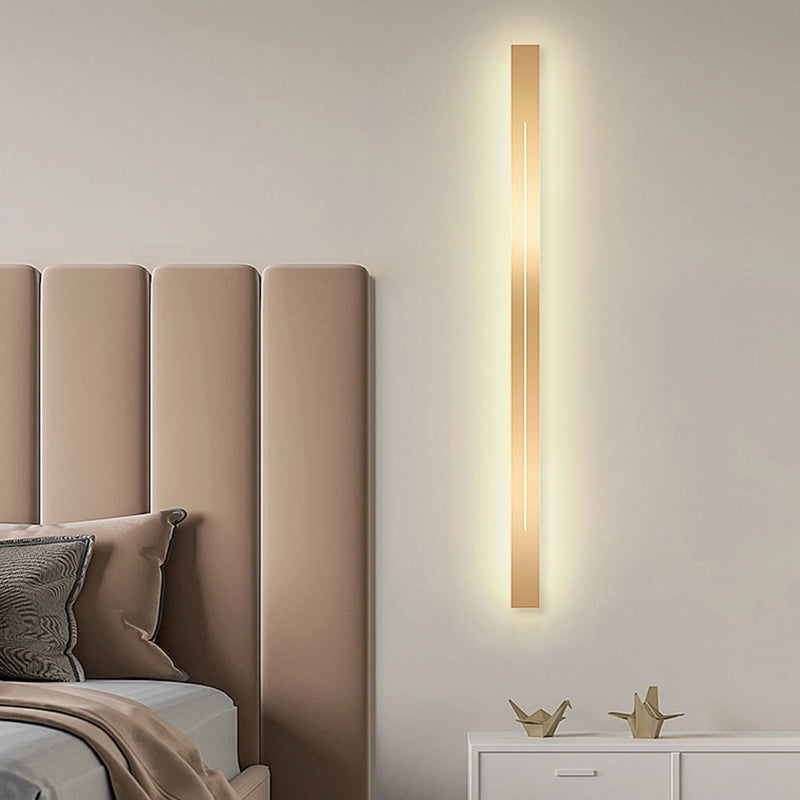 Minimalist Slim Gold Bar Pendant Necklace with a modern vertical design displayed against a wooden background, showcasing its elegant and sleek appearance.