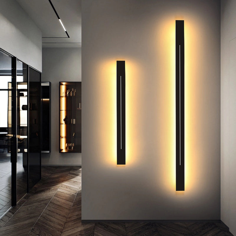 Minimalist Slim Gold Bar Pendant Necklace with a modern vertical design displayed on a black background.