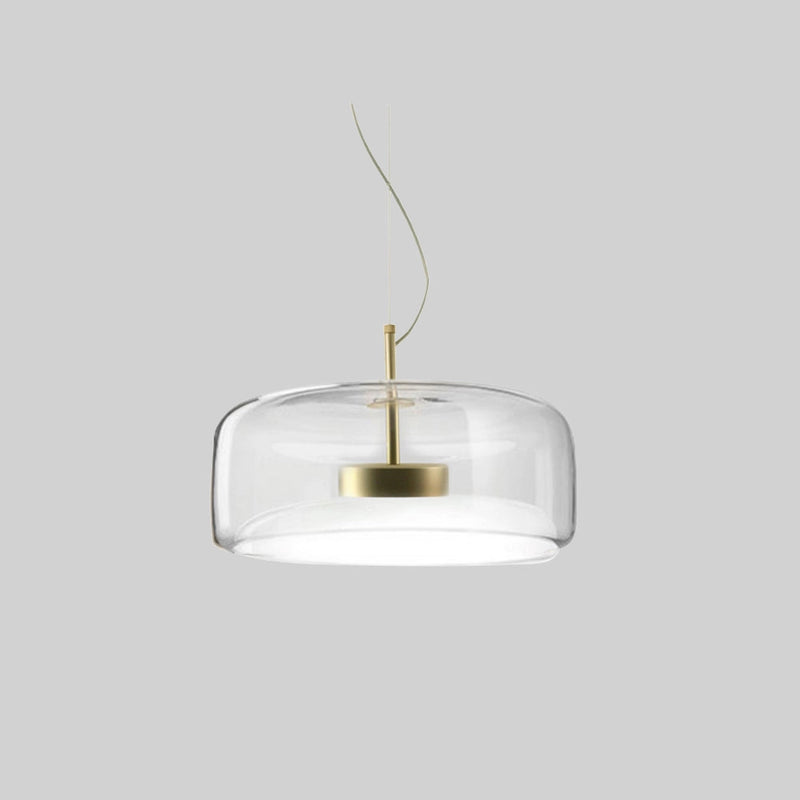 Modern glass pendant light with brass accents, 35CM clear dimmable ceiling fixture, hanging from a ceiling with a circular shape and elegant design.