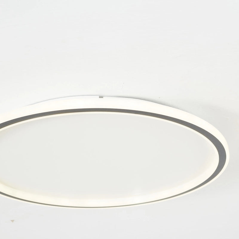 Modern LED circular ceiling light with minimalist design, energy-efficient flush mount in beige and metal finish.