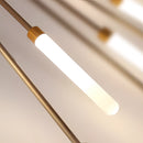 Modern Starburst Wall Art in Mid-Century style featuring black and gold metal sculpture with radiating lines.