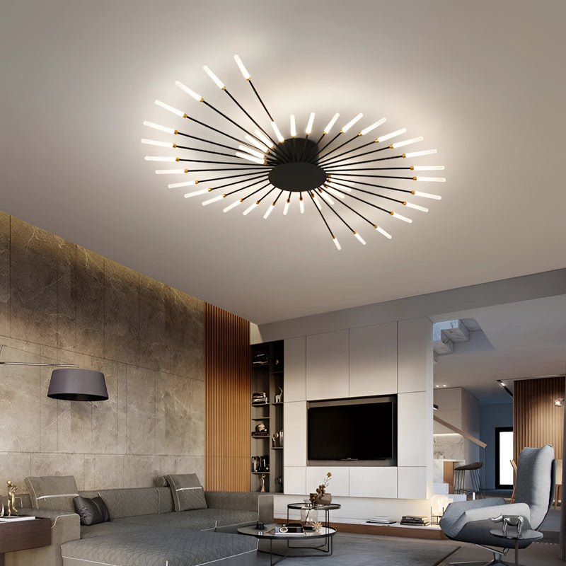 Modern Starburst Wall Art - Mid-Century Black Gold Metal Sculpture hanging on a wall in a stylish living room with contemporary furniture, including a couch and a wooden table, illuminated by soft lighting.