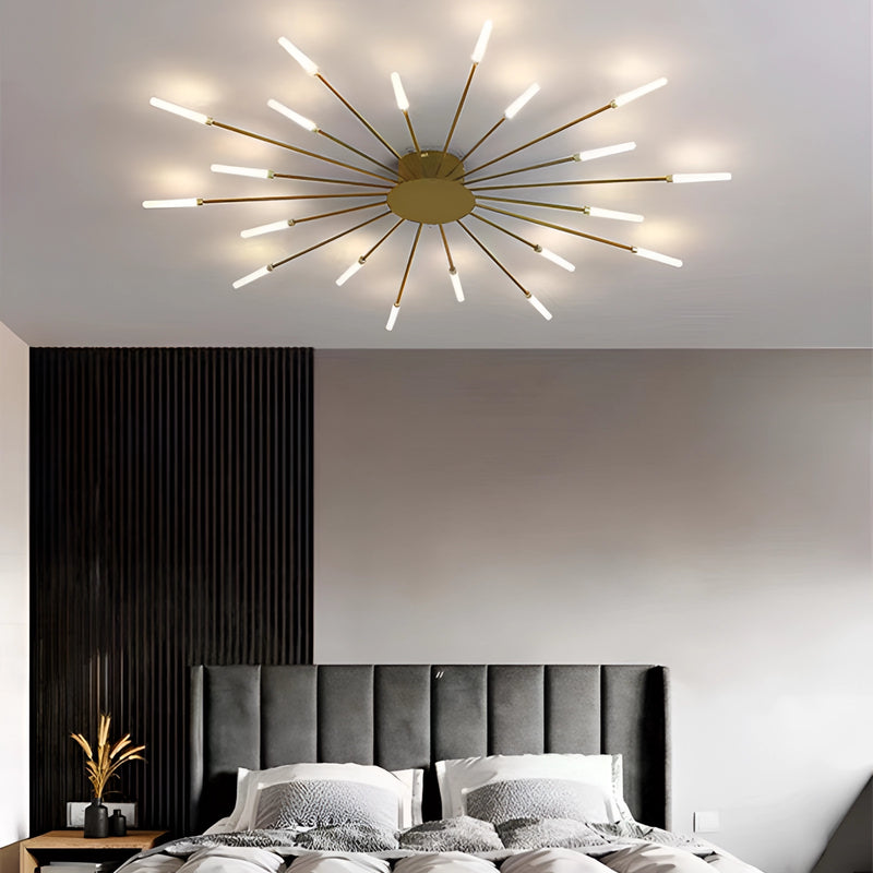 Modern Starburst Wall Art - Mid-Century Black Gold Metal Sculpture, Golden variant, displayed in a well-lit white interior, mounted on a wooden wall above a comfortable piece of furniture.