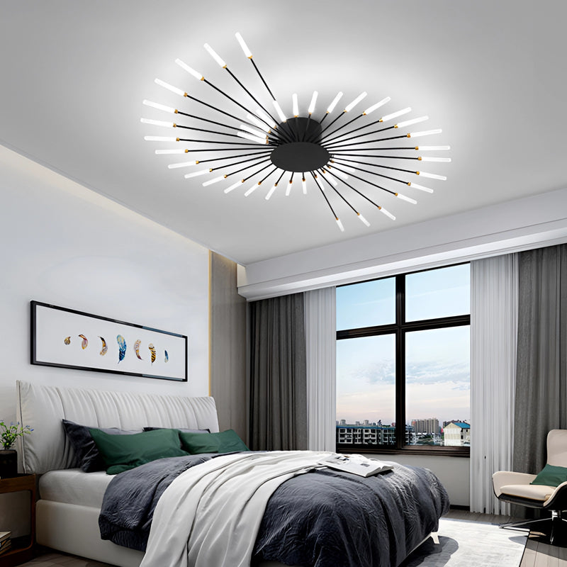 Modern Starburst Wall Art - Mid-Century Black Gold Metal Sculpture with black finish in 42-inch spiral design, mounted on a grey wall in a well-lit modern interior with wooden furniture and large window.