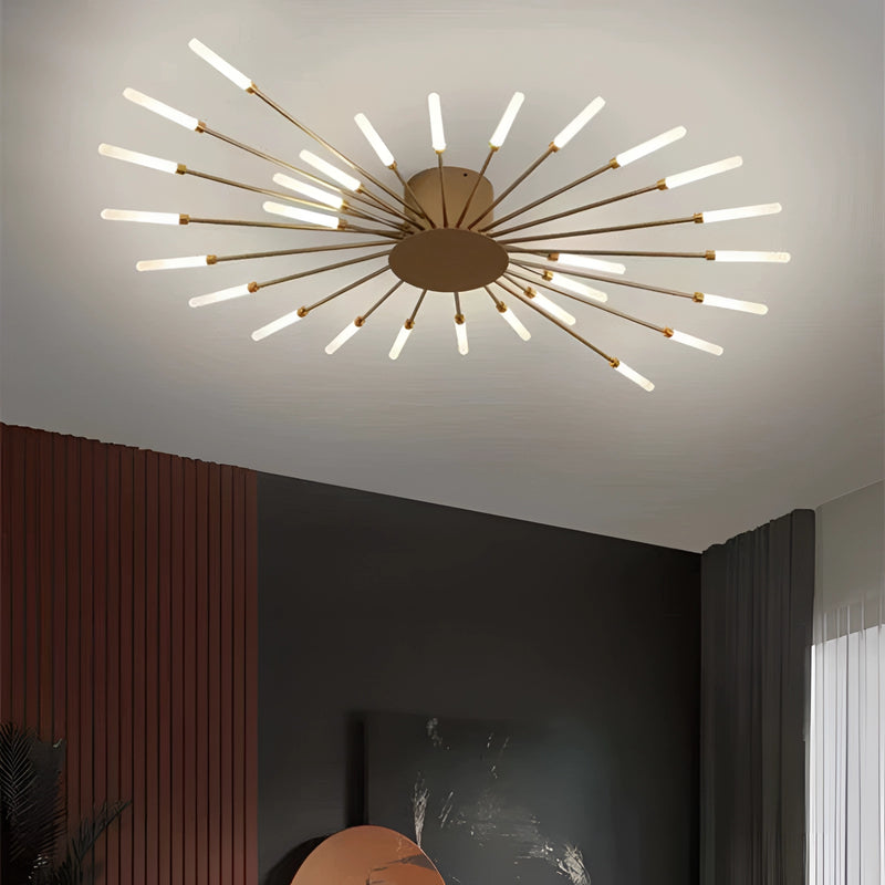 Modern Starburst Wall Art - Mid-Century Black Gold Metal Sculpture hanging on a wall with a wooden texture background.