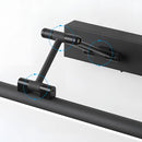 Sleek black dimmable LED picture light, cordless and adjustable, wall-mounted with a metallic finish.