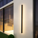 Slim Vertical LED Wall Sconce in warm white, 120CM, mounted on an exterior building facade with minimalist design, rectangular shape, and waterproof feature.